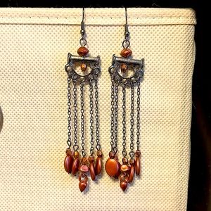 Silver earrings with copper colored beads